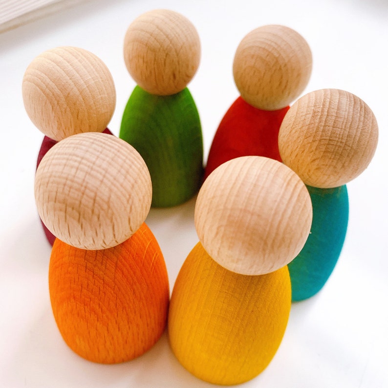 Wooden peg dolls woodstains peg dolls rainbow peg dolls rainbow colour dolls peg dolls collection red peg doll blue green yellow purple dolls plain dolls Waldorf dolls set